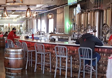 Restaurant Furniture Brews a New Industrial Look for Akademia’s Décor