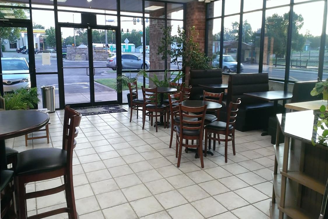 wood ladder back chairs and 3 channels booths in a local bakery