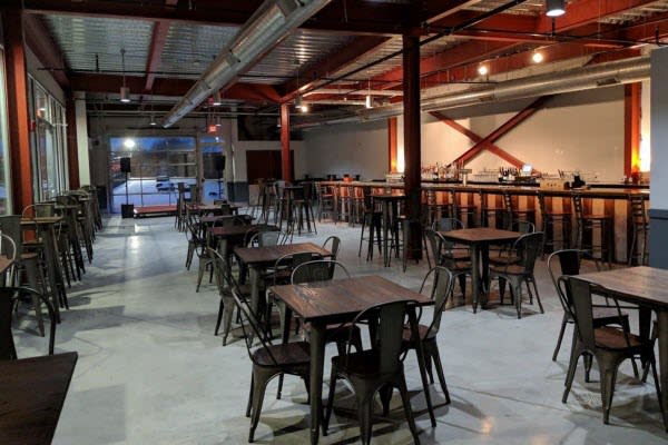 tolix style restaurant chairs and industrial tables